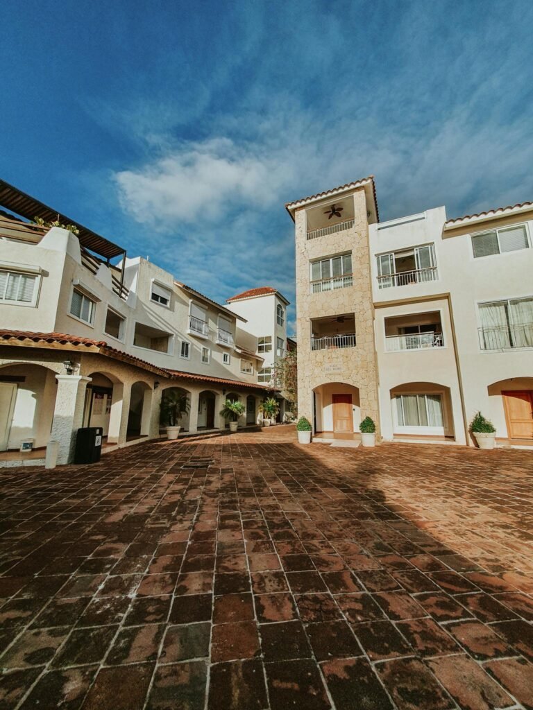 Beautiful resort courtyard in Bayahíbe, Dominican Republic, showcasing vibrant architecture.